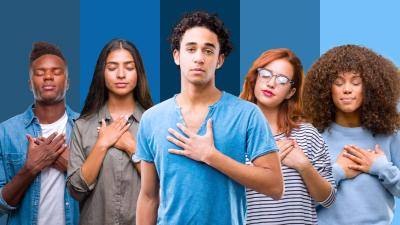 5 people of various ethnicities, holding their hands on their chest, eyes closed, on a blue background.