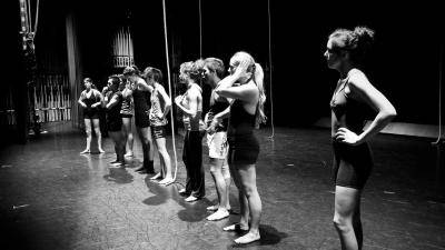line up of dancers in rehearsal