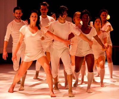 LA Contemporary Dance Company company in white, in a tight group