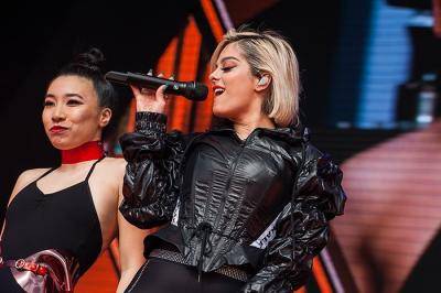 Dance artist Steph Lee on stage with Bebe Rexha