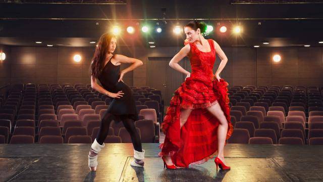 A ballet dancer and a flamenco dancer face off on stage